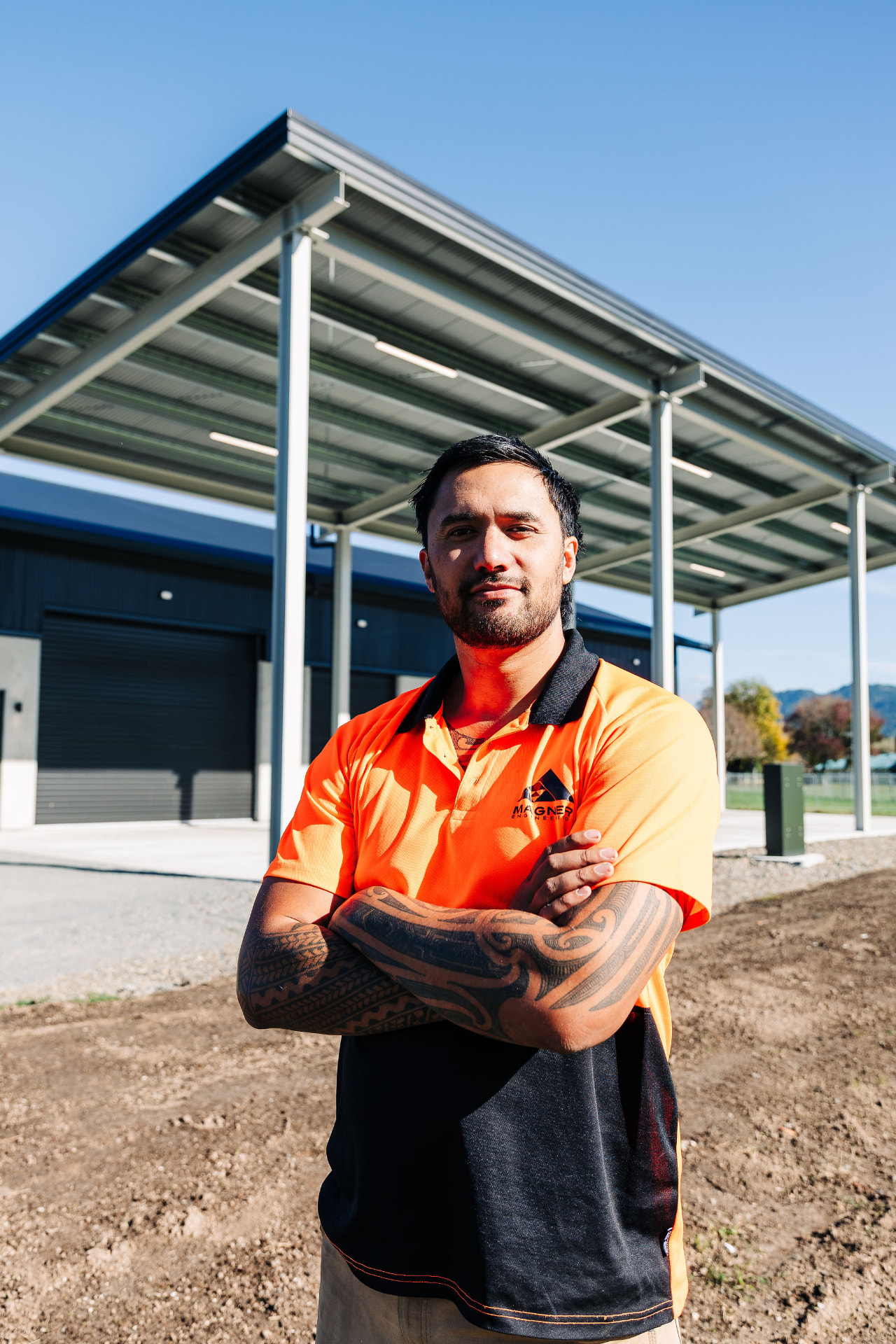 Tahiwi Magner standing outside an industrial building in Waikato