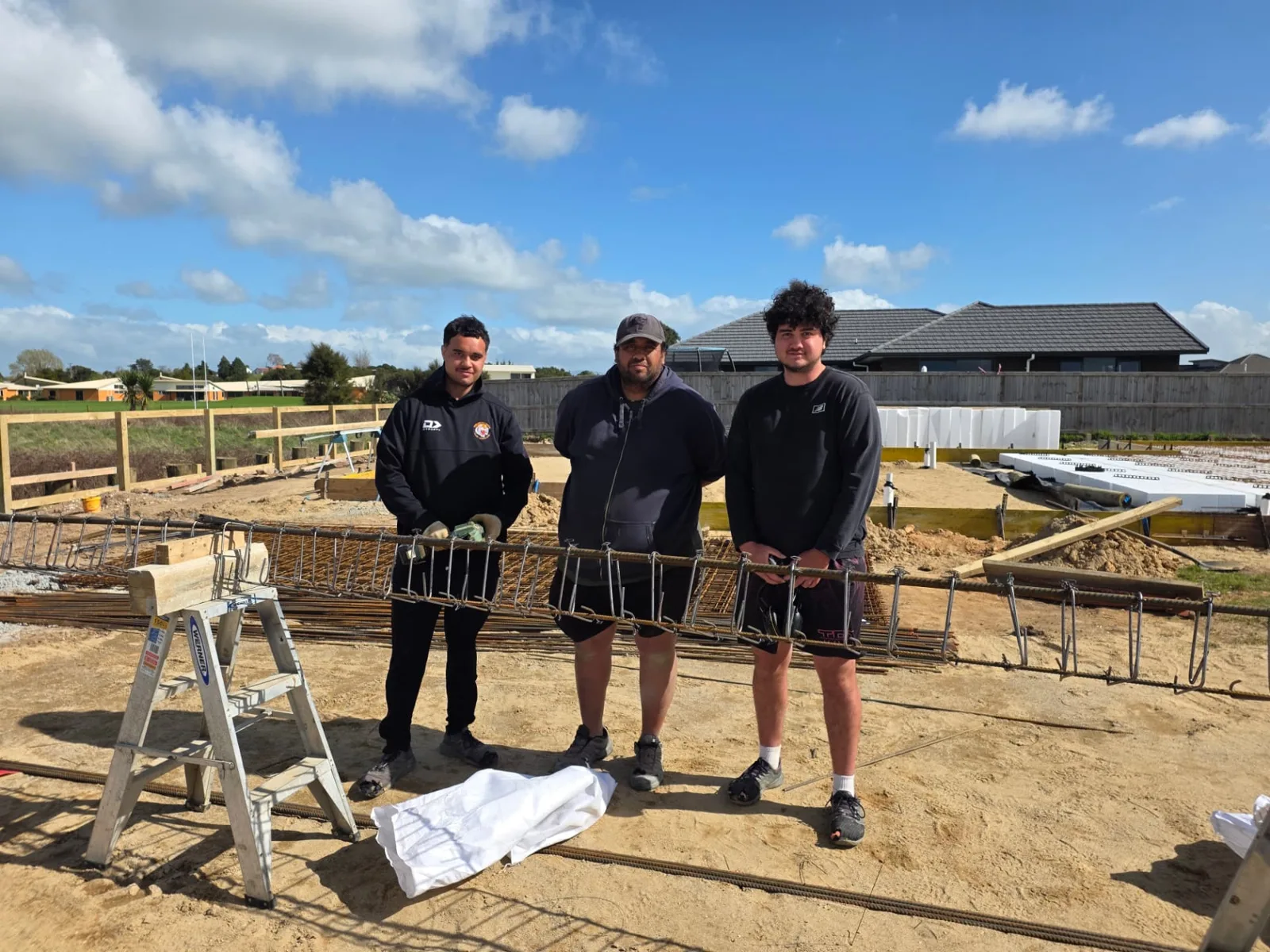 Walter Greenland with his sons Bailey and Teohonga on a building site in the Waikato